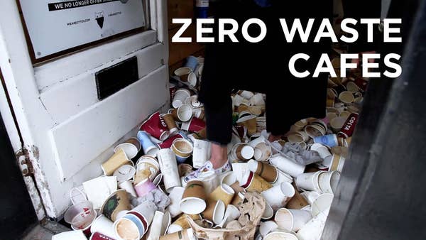 person walking through many coffee cups on the ground