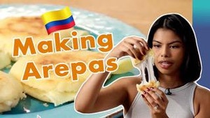 Vanessa staring at the stretching cheese as she pulls apart an arepa with "Making Arepas" text with the Colombian flag over the plate of finishing arepas