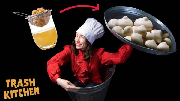 Woman wearing red shirt and white chef's hat in trashcan holding trash can lid as if it is a food platter. There are aquafaba meringues on the trash can lid food platter. 