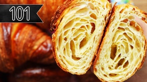 A shot of a croissant cut in half.