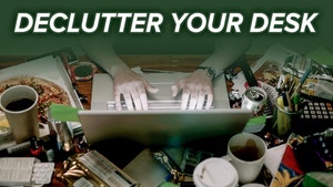 A man works at his computer with clutter all around him. The title at the top reads: "Declutter Your Desk"