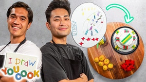 Owen Han and H Woo Lee standing back to back in front of a drawing-inspired dish.
