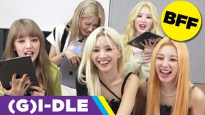The 5 K-Pop members of (G) I-DLE smile and laugh. The BFF emoji is in the corner and the text, "(G)I-DLE" is in the opposite corner.