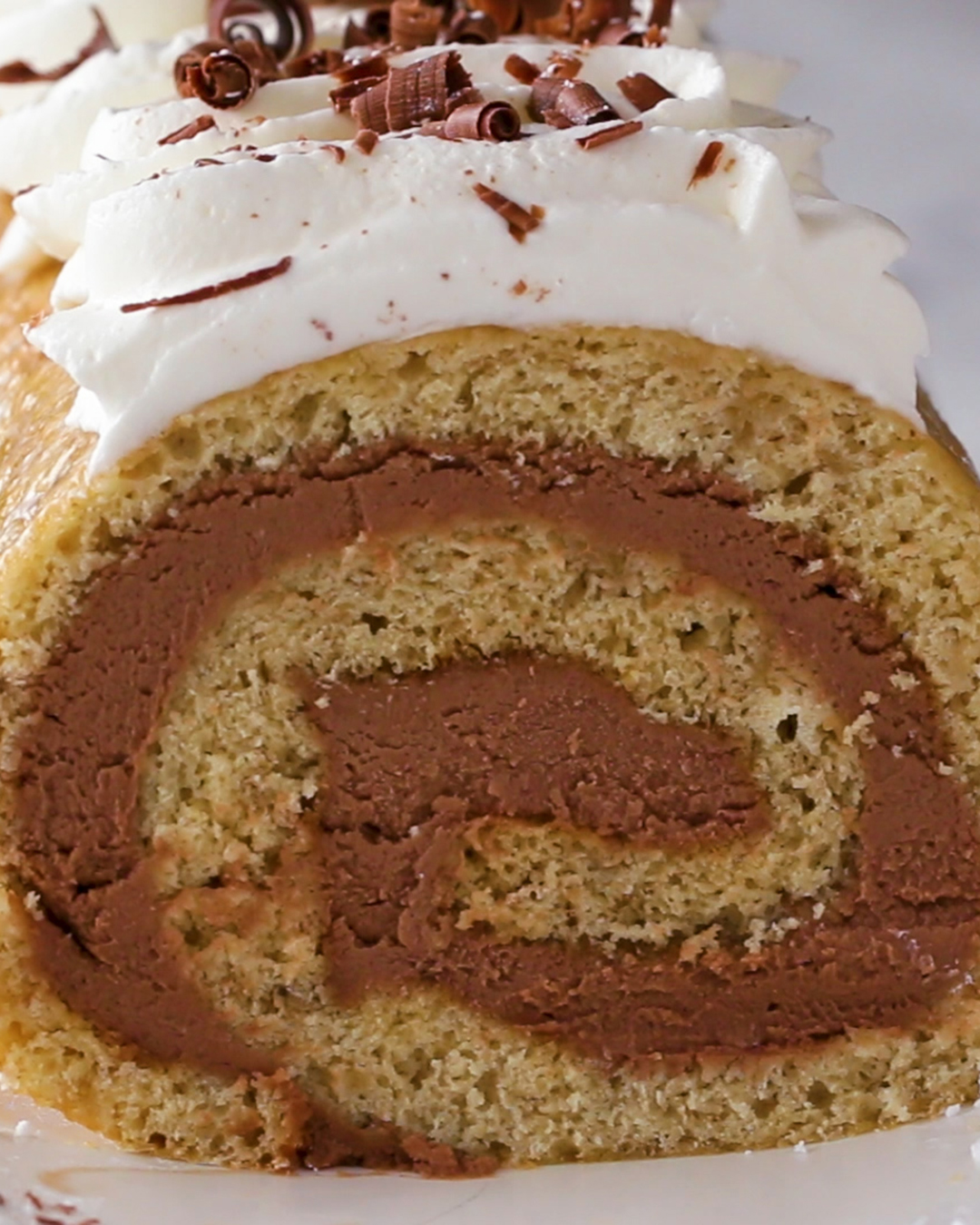 Banana Bread Chocolate Cheesecake Swiss Roll Recipe by Tasty
